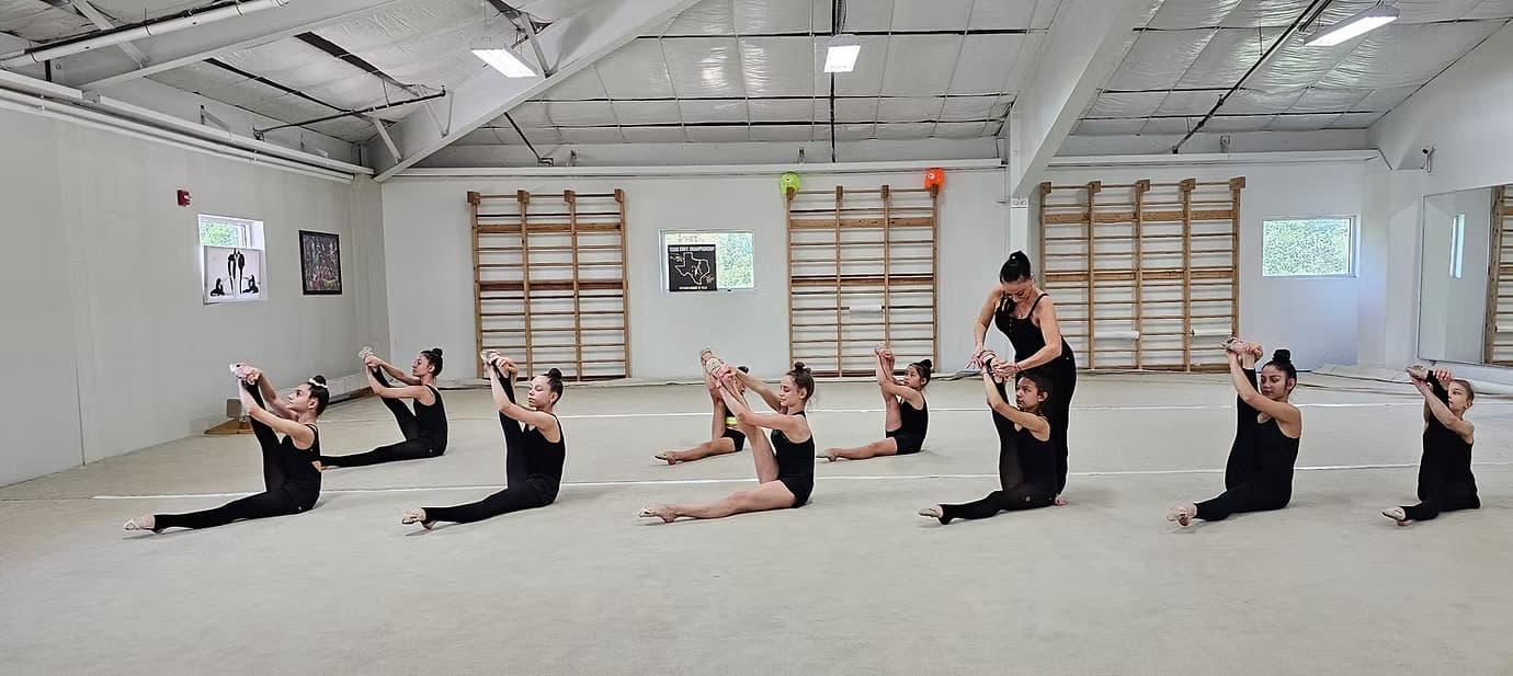 Ella Rasin coaching a group flexibility class