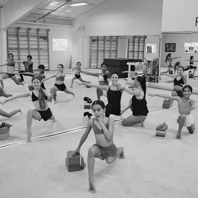 Coach Ella leading flexibility training